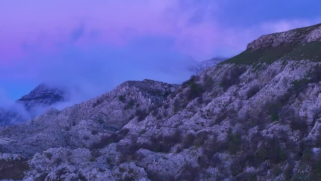 Sunset lights in Los Machucos at 921 meters above sea level and communicates the villages of Bustablado and San Roque de Riomiera. Pasiegos Valleys, Cantabria, Spain, Europe