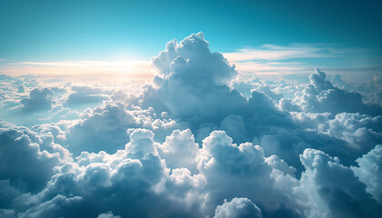 Naklejka premium Beautiful above clouds cloudscape with a majestic wide angle horizon view during aircraft flying journey. Beauty of surrounding environment and traveling concept.