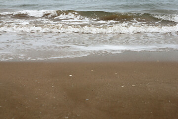 Mediterranean Sea. Beautiful clean sand and sea foam.