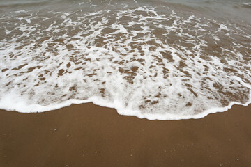 Mediterranean Sea. Beautiful clean sand and sea foam.