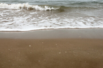 Mediterranean Sea. Beautiful clean sand and sea foam.