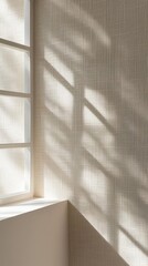 Soft natural light streaming through a minimalist window, casting gentle, blurred shadows on a textured wallpaper, creating an abstract, serene backdrop
