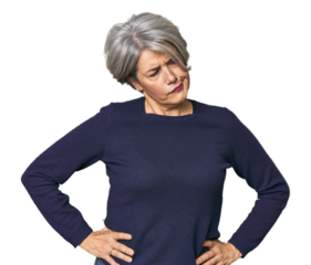 Caucasian mid-age female on studio background confused, feels doubtful and unsure.