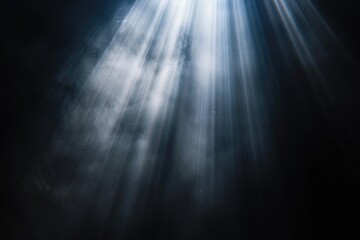 Sun rays isolated on black background for design overlay.