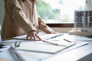 Architect could develop a concept for the design house in modern office.