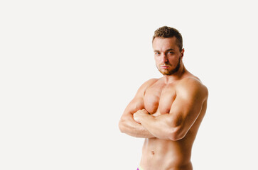 Fototapeta premium Handsome man with an athletic body. Fitness and healthy lifestyle.