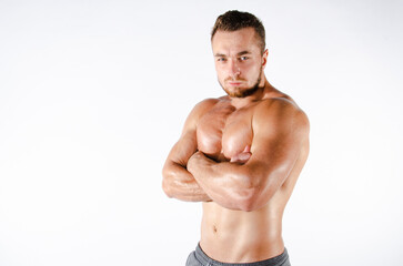 Fototapeta premium Handsome man with an athletic body. Fitness and healthy lifestyle.