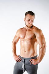 Fototapeta premium Handsome man with an athletic body. Fitness and healthy lifestyle.
