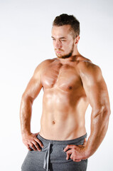 Fototapeta premium Handsome man with an athletic body. Fitness and healthy lifestyle.