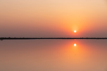 Reflection of the sun in a salt lake.