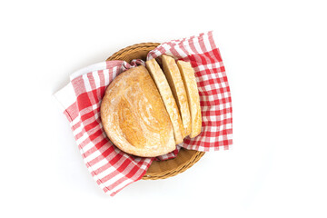 Fresh slice of bread in basket with napkin on a white background for breakfast.