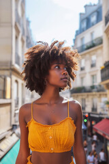 Fashionable black woman in summer Paris