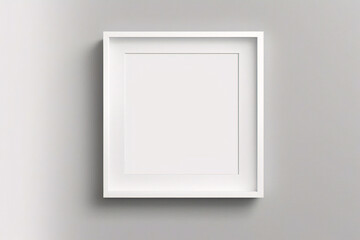 窓の光と影を持つ白い壁の背景に掛かっている最小限の空の正方形の白いフレーム画像のモックアップ。画像を分離する