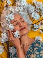 Embracing Nature's Beauty: Serene Elderly White Woman with Cherry Blossoms on Mother Earth Day