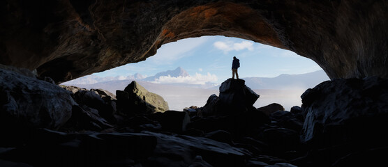 Adult adventurous man standing in a cave. 3d rendering mountain adventure artwork.