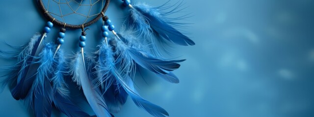 Ethereal Blue Dreamcatcher against Serene Sky-Blue Background for Tranquil Decor, copy space