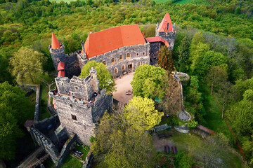 Grodziec Castle surrounded by green forest, aerial view. Old historical fortress. Famous touristic place in Lower Silesia, Poland