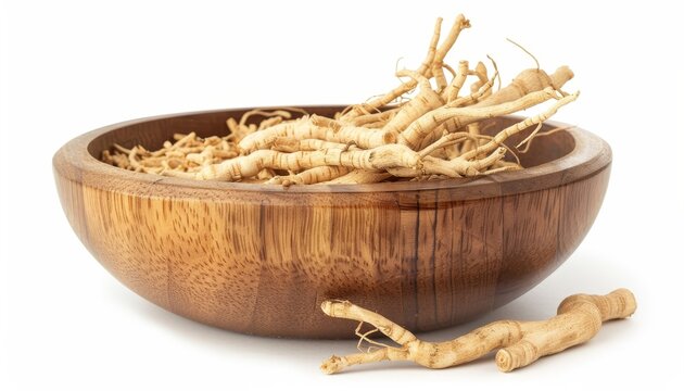 Siberian ginseng in Latin Eleutherococcus senticosus in wooden bowl isolated on white background A medicinal herb