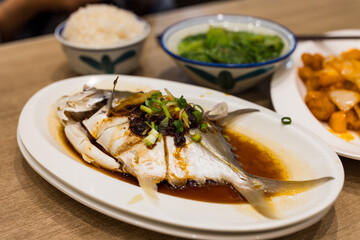 Steamed fish with soy sauce in Hong Kong cuisine restaurant