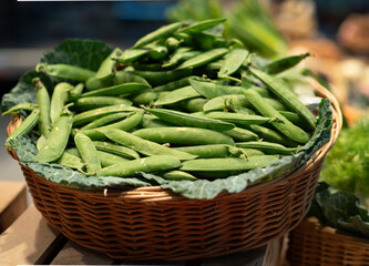  Basket of peas on display for sale at the market