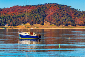 Boats and motorboats on sunny lake, in Valle de Bravo state of Mexico