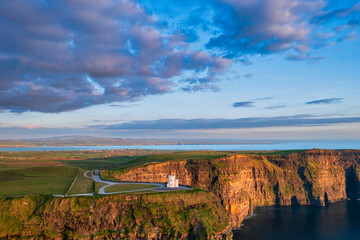 Aerial landscape with the Cliffs of Moher in County Clare at sunset, Ireland. - obrazy, fototapety, plakaty