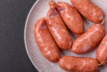 Baked chicken or pork sausages, salt, spices and herbs