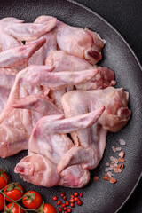 Fresh chicken wings with salt, spices and herbs