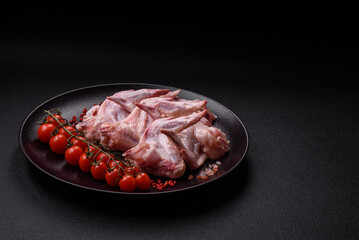 Fresh chicken wings with salt, spices and herbs