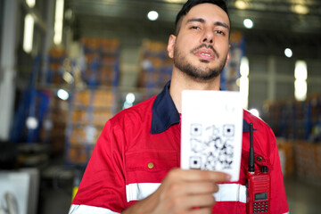 Warehouse worker working in warehouse storage. Foreman or worker work at factory site check up...