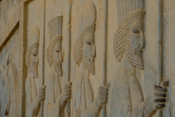 Reliefs at the ruins of Persepolis near the city of Shiraz in Fars province, Iran.