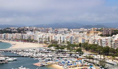 Beautiful view of the city and embankment on the summer day. Blanes. Spain.