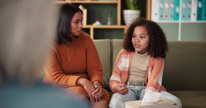Mom, daughter and talking with therapy for mental health, trauma or behavior discussion and sad. Psychology, parent and kid in counseling session for depression, anxiety and professional support