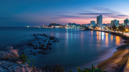 Fototapeta premium Nocturnal Views. Cityscape with Lights and Sea Horizon, Ideal