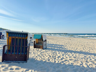 Strandkorb. wicker beach chairs on a beach at the baltic sea in usedom, germany