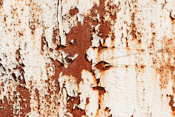 Texture of old rusty metal with scratches and mother-in-law. Abstract grunge metal texture with traces of multi-colored paint