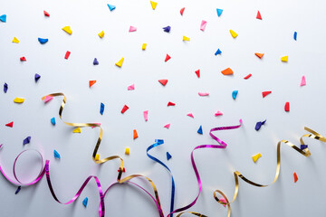 Creative composition made with party streamers on white background. Minimal celebration party...