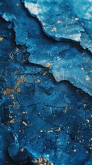 Obraz premium Blue and gold abstract painting with a rough texture.