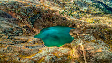 Blue Lake Como Surrounded by Rocky Terrain