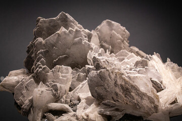Baryte stone formations in region country. Gemstone texture on the black background. Stone wallpaper