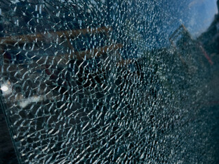 close up of a shattered hardened glass