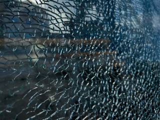 close up of a shattered hardened glass