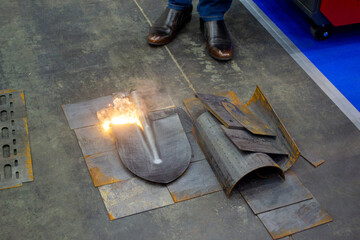 Laser cleaning of metal. Laser removes removing old rust from metal. The laser beam cleans the...