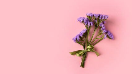 Mothers day background with violet flowers