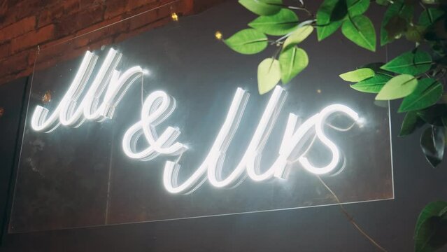 Mr and Mrs neon sign with decor
