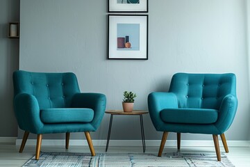 A medium photo of a minimalist living room with two teal armchairs placed on either side of a small table