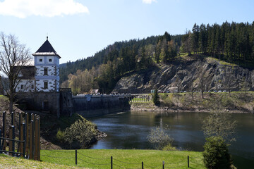 Fototapeta premium Spindleruv Mlyn, Czech Republic - April 27, 2024 - The Labska Reservoir or Labska Dam near Spindleruv Mlyn at the beginning of spring