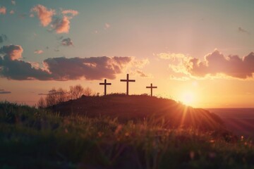 Three crosses on a hill at sunset, ideal for religious themes