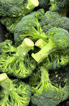 Pile of fresh broccoli crowns