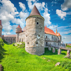 Captivating morning view of Hunyad Castle / Corvin's Castle with wooden bridge.